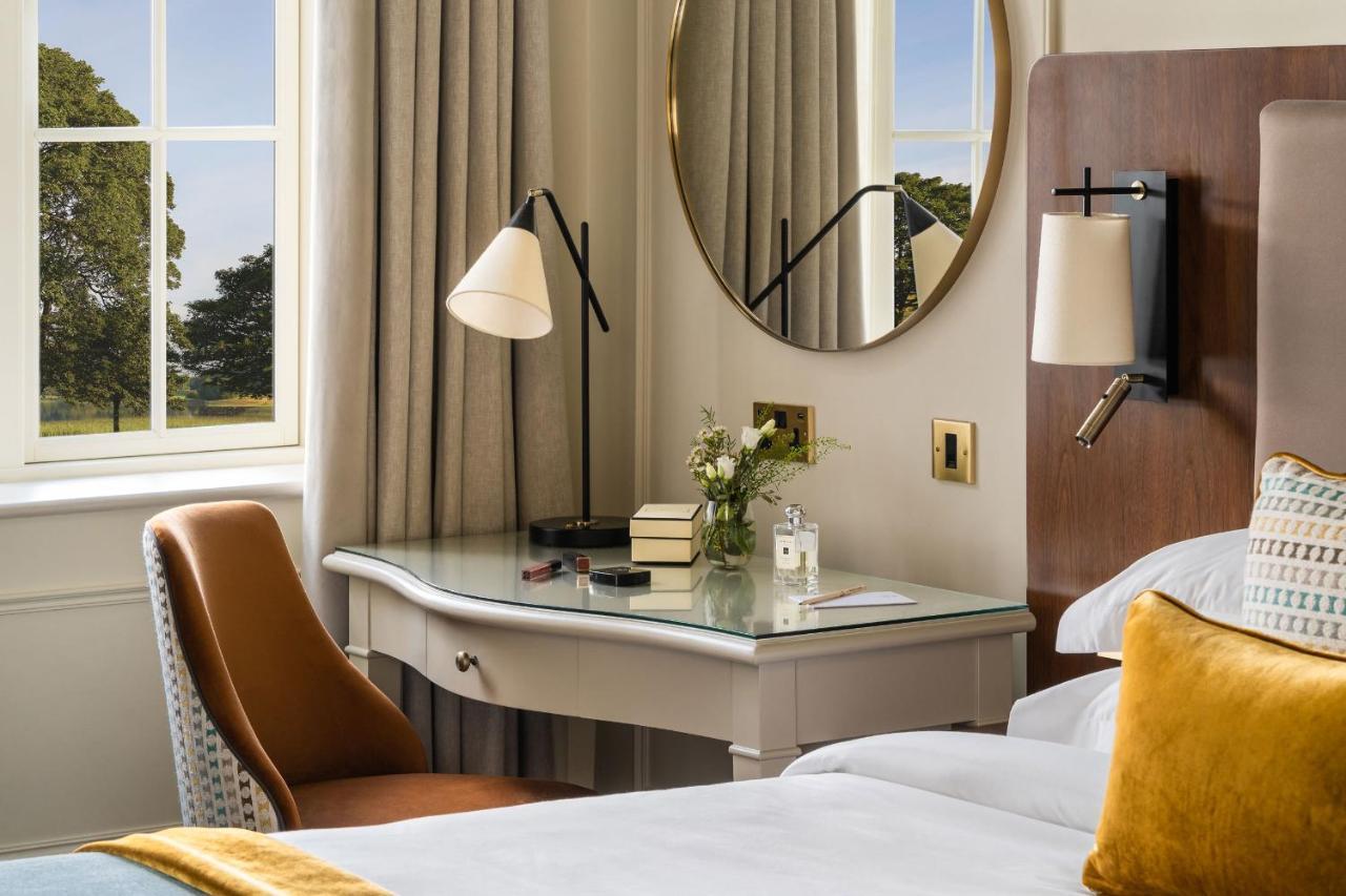 Lough Erne Resort Enniskillen Exterior foto A bedroom at The Grove