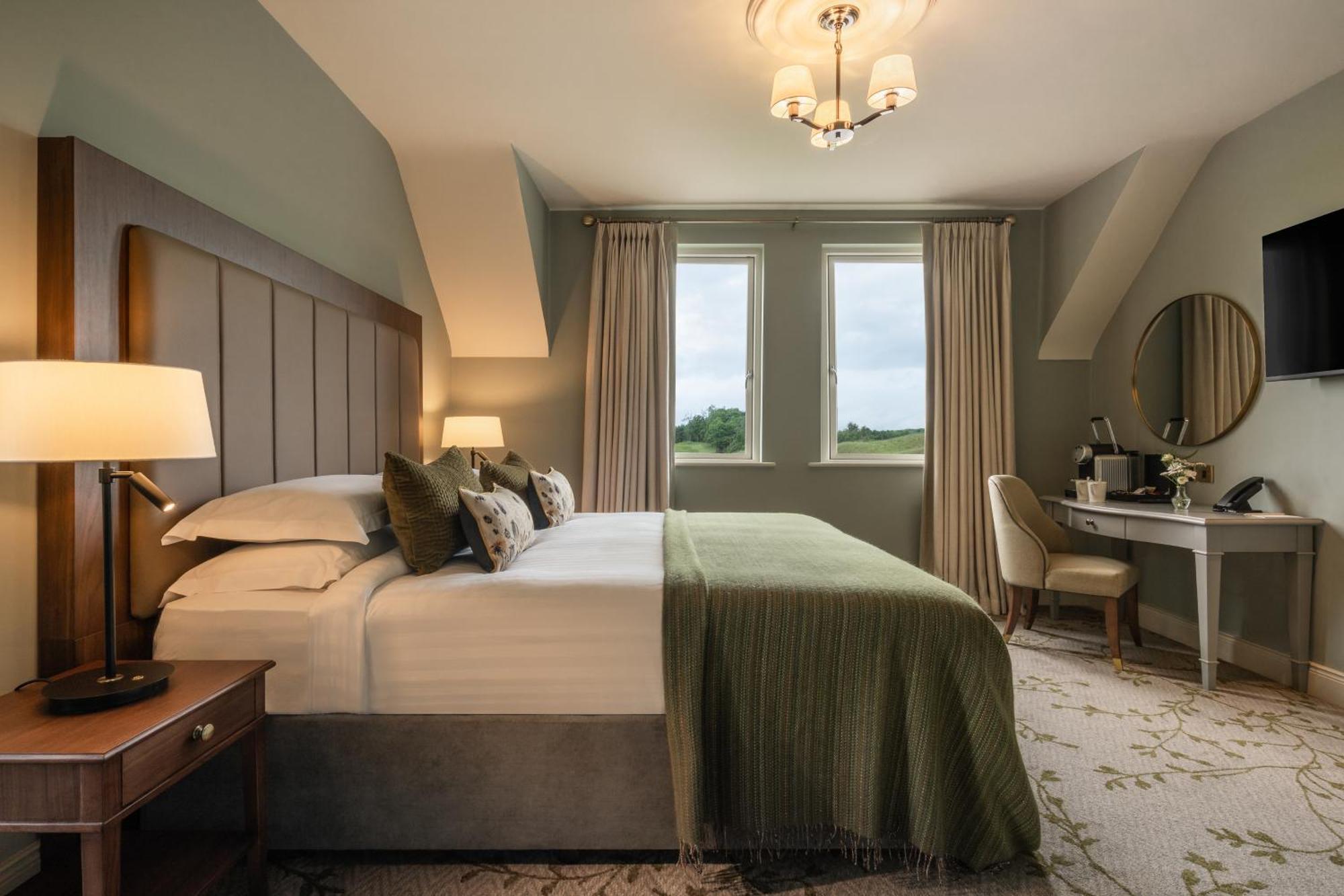 Lough Erne Resort Enniskillen Exterior foto A bedroom at The Grove